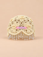 Bonnet bohème au crochet à perles et pompons, beige, vue de face