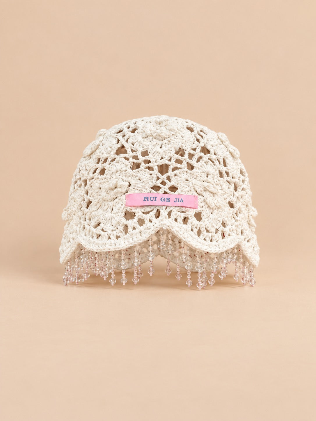 Bonnet bohème au crochet à perles et pompons, blanc, vue de face