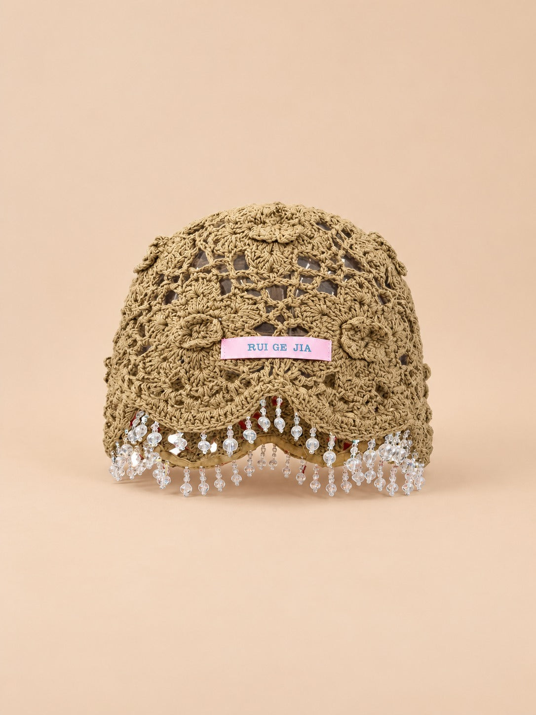 Bonnet bohème au crochet à perles et pompons, kaki, vue de face