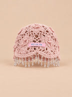 Bonnet bohème au crochet à perles et pompons, rose, vue de face