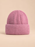 Bonnet femme en fourrure de lapin et coton épais, modèle 2, vue de face sur fond pêche sable