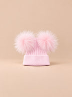 Gorro de mezcla de cachemira con doble pompón de mapache, pompones a juego, color rosa, vista frontal