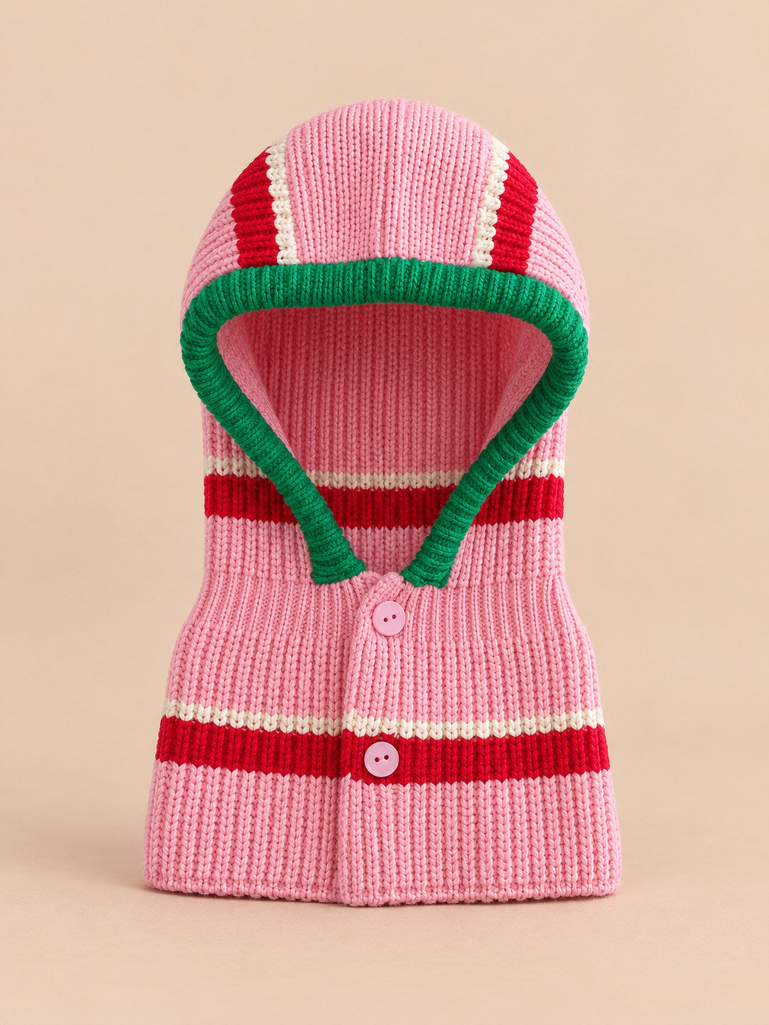 Cagoule bébé en laine rayée modèle C, vue de face, fond pêche sable