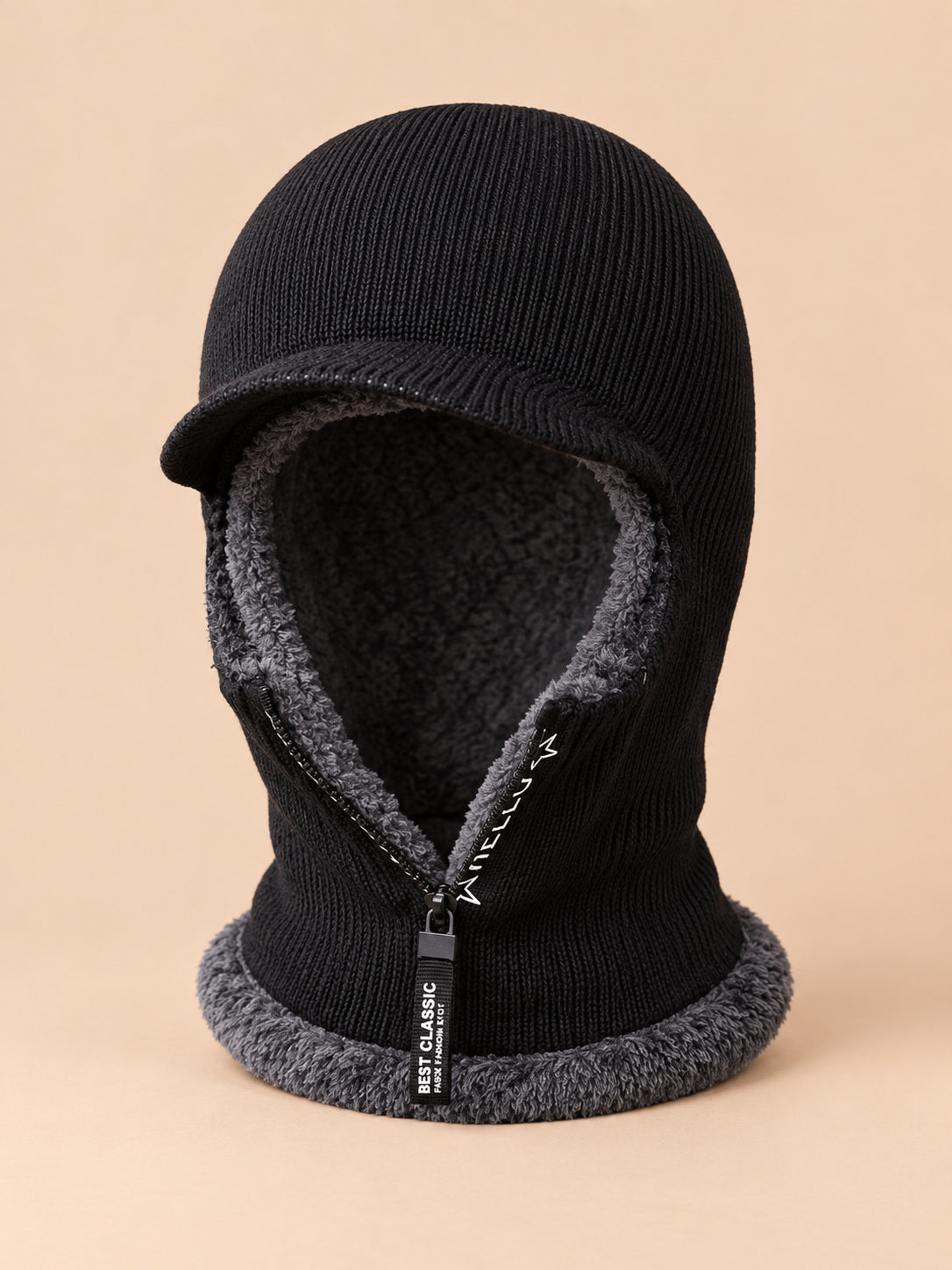 Cagoule homme tricotée noir, doublure polaire, visière et fermeture zippée, vue de face