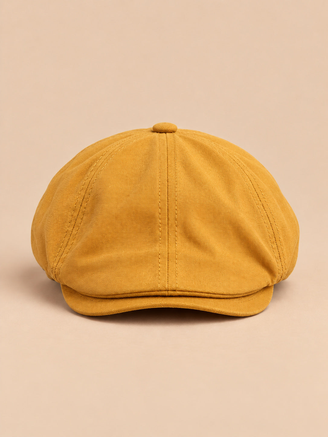 Casquette gavroche plate jaune style britannique vintage, vue de face