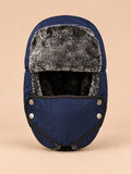 Chapka aviateur avec masque coupe-vent bleu, vue de face.