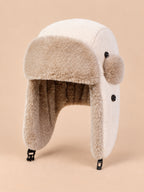 Gorro aviador de pana lisa con orejeras, color beige, vista de tres cuartos en la fotografía del producto