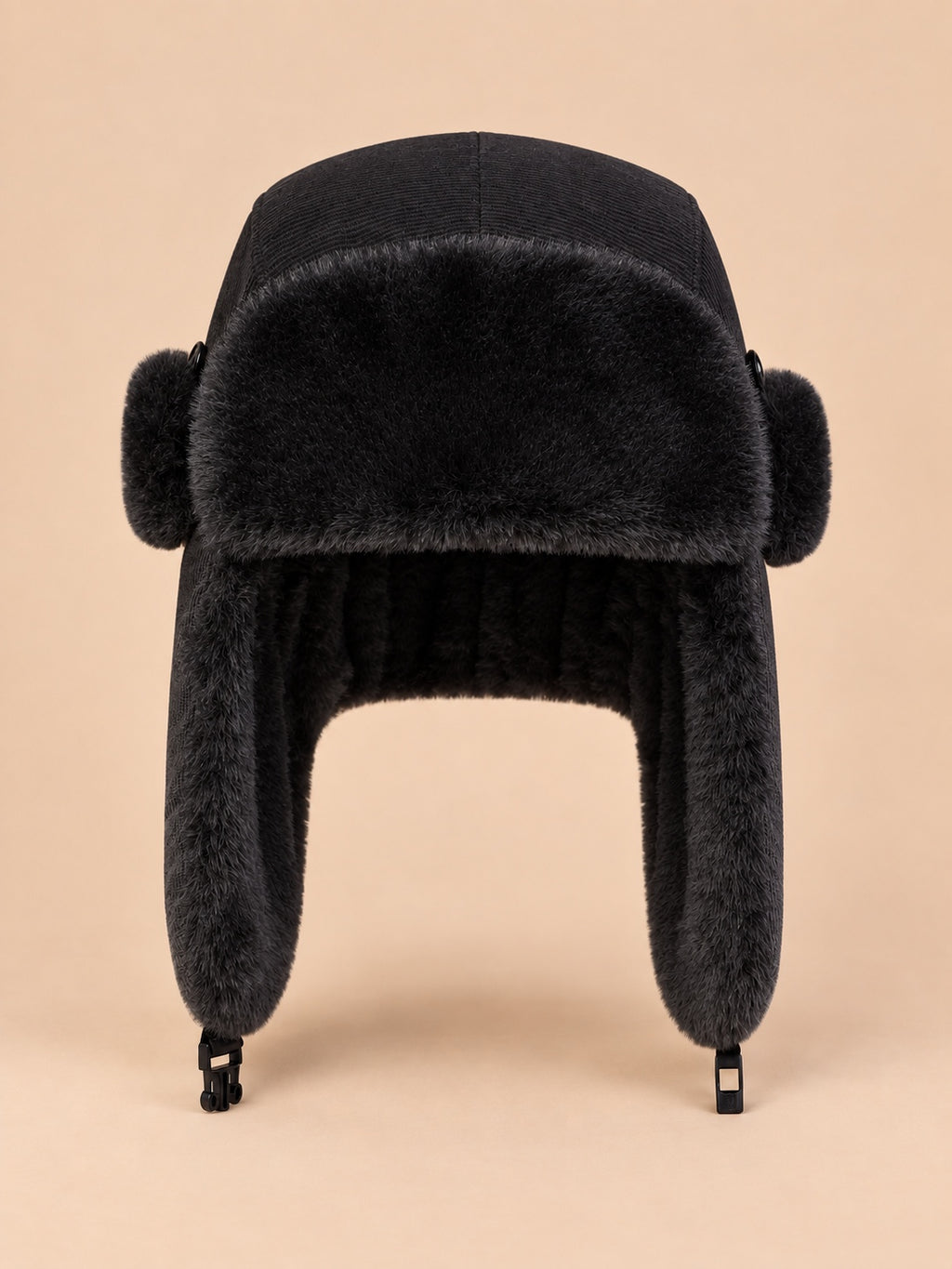 Gorro aviador de pana lisa con orejeras, color negro, vista frontal en la fotografía del producto