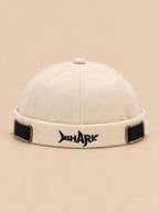 Bonnet docker Bocca blanc en coton, broderie SHARK et boucles réglables, vue de face.