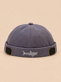 Bonnet docker Bocca bleu gris en coton, broderie SHARK et boucles réglables, vue de face.