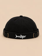 Bonnet docker Bocca noir en coton, broderie SHARK et boucles réglables, vue de face.