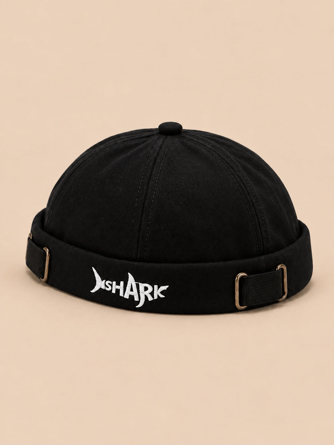 Bonnet docker Bocca noir en coton, broderie SHARK et boucles réglables, vue de trois quarts.