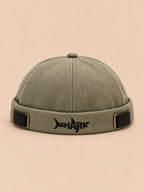 Bonnet docker Bocca vert en coton, broderie SHARK et boucles réglables, vue de face.