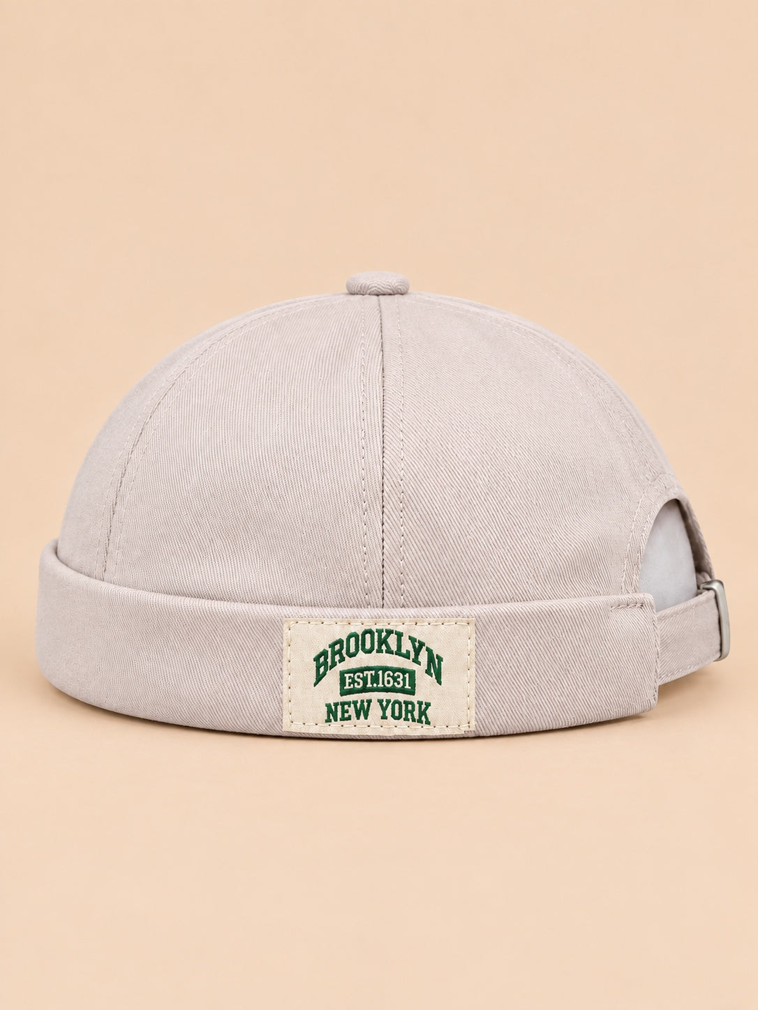Bonnet docker BROOKLYN1631 beige, vue de face, étiquette vintage.