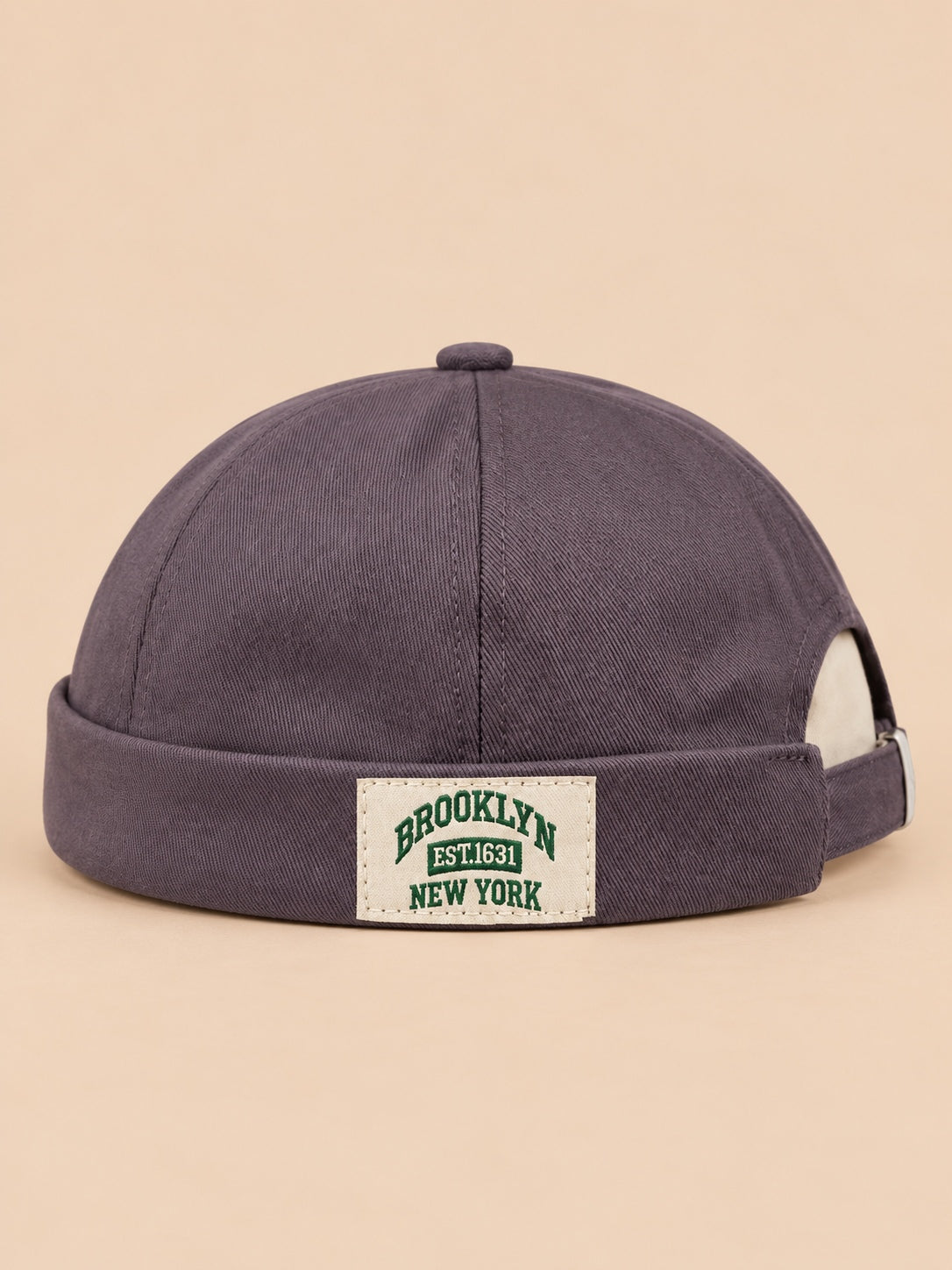 Bonnet docker BROOKLYN1631 gris, vue de face, étiquette vintage.