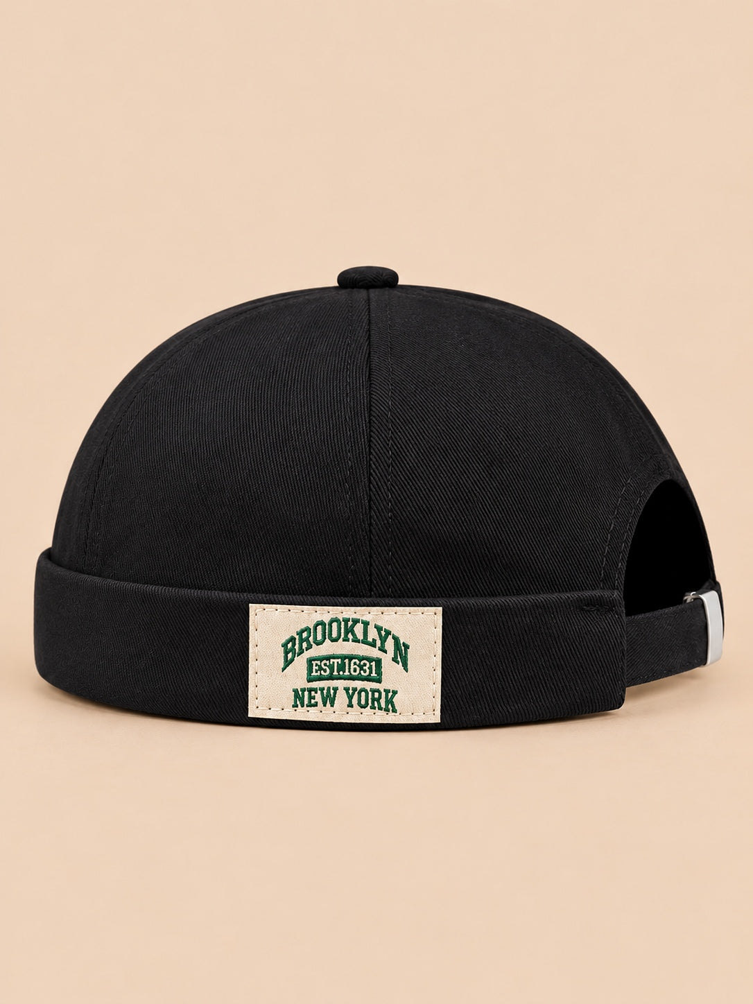 Bonnet docker BROOKLYN1631 noir, vue de face, étiquette vintage.