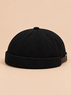 Bonnet docker style ouvrier noir, vue de trois quarts.