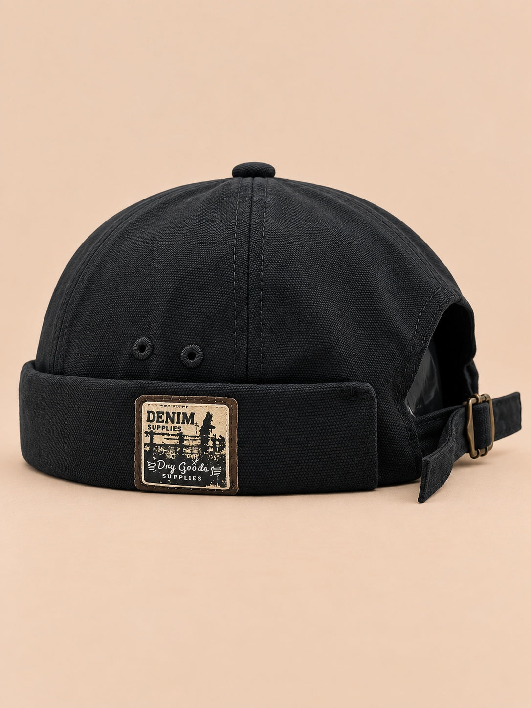 Bonnet docker réversible noir, vue de face.