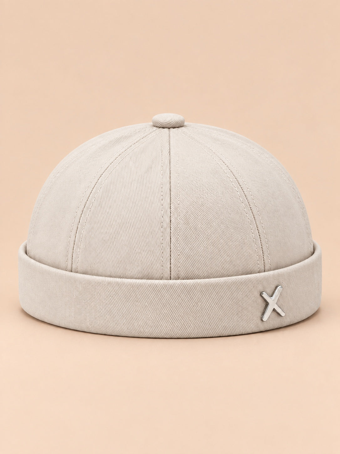 Bonnet docker vintage délavé beige, vue de face.