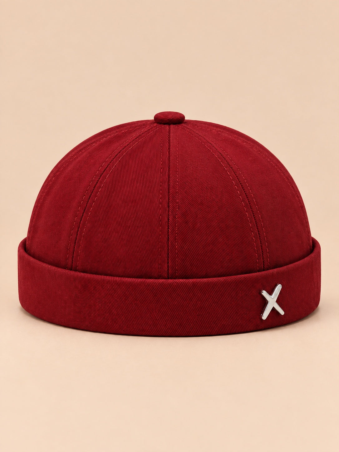 Bonnet docker vintage délavé rouge, vue de face.