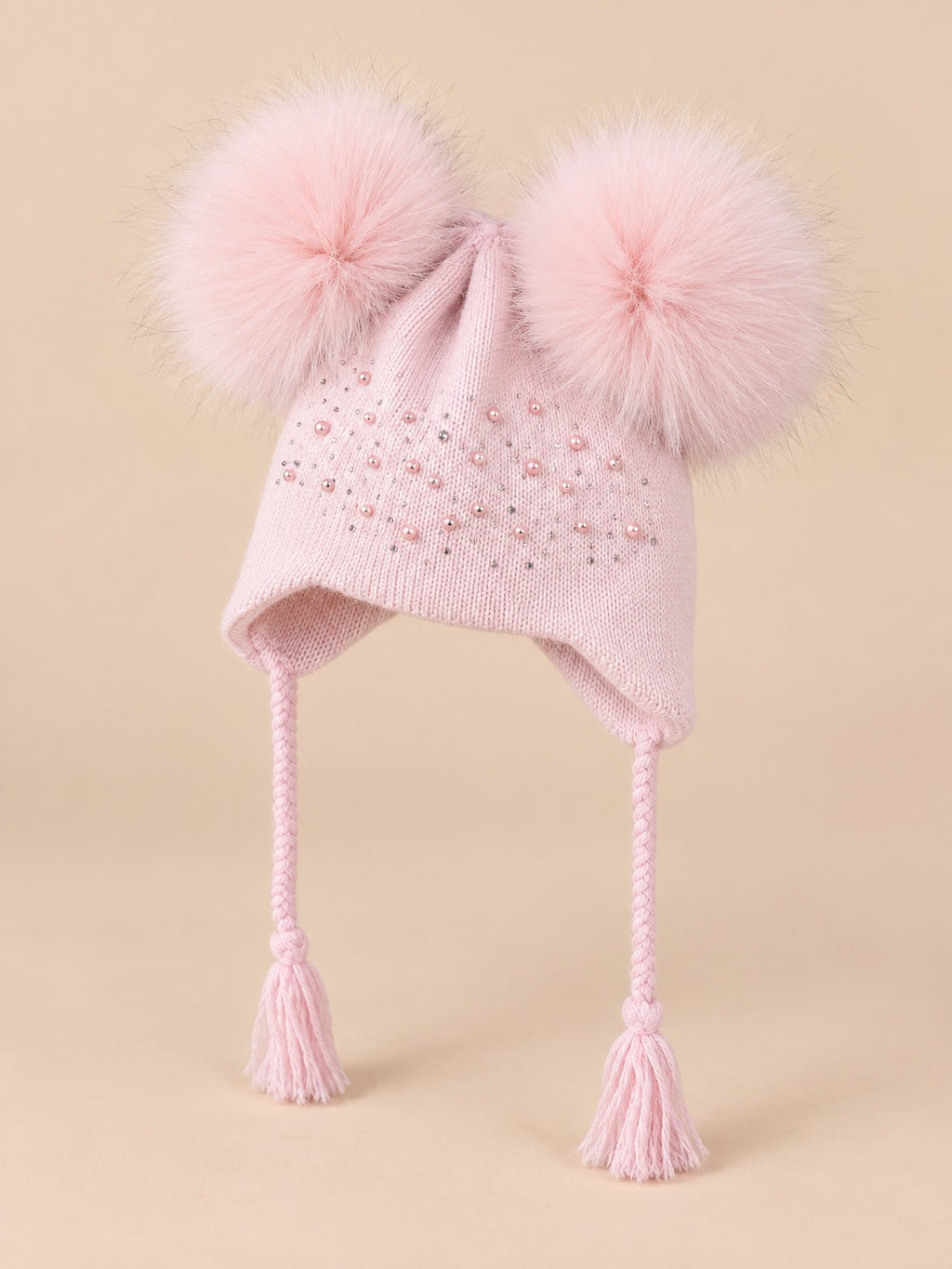 Gorro infantil con doble pompón de pelo de mapache, pompones a juego, color rosa, vista de tres cuartos
