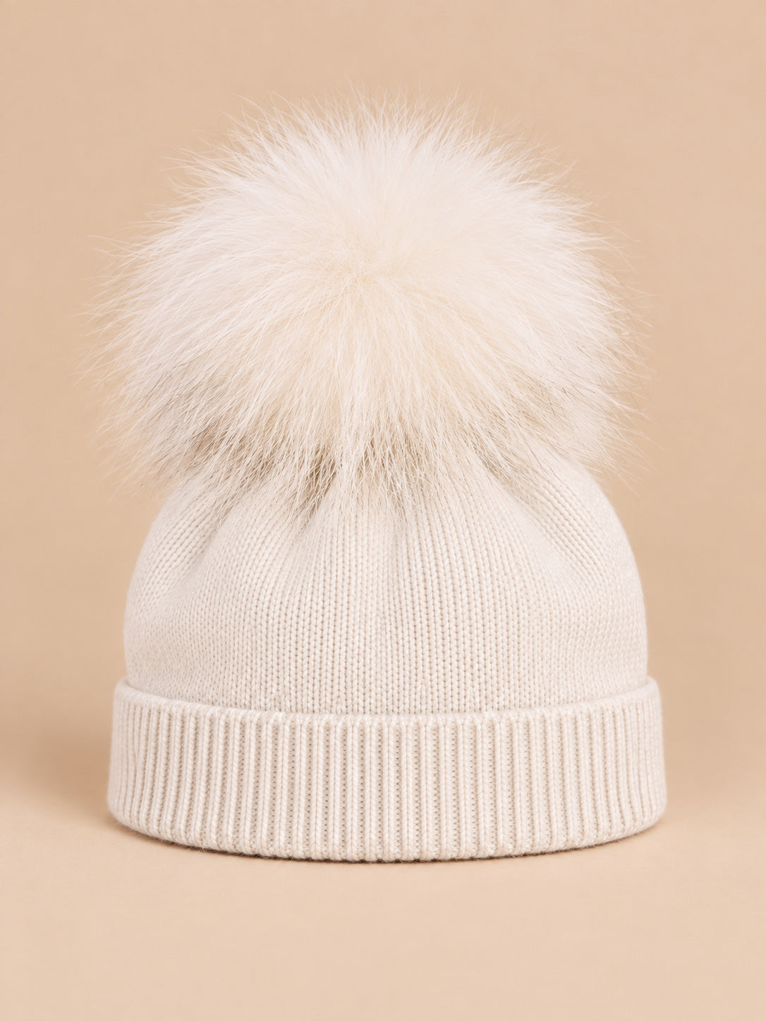 Bonnet enfant blanc pompon assorti en maille à revers, vue de face