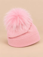Gorro infantil en mezcla de lana con pompón de pelo, color rosa, vista de tres cuartos