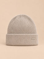 Bonnet côtelé en laine mélangée, coloris 2 beige, vue de face sur fond pêche sable