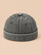 Bonnet marin docker en denim délavé vert, vue de face.