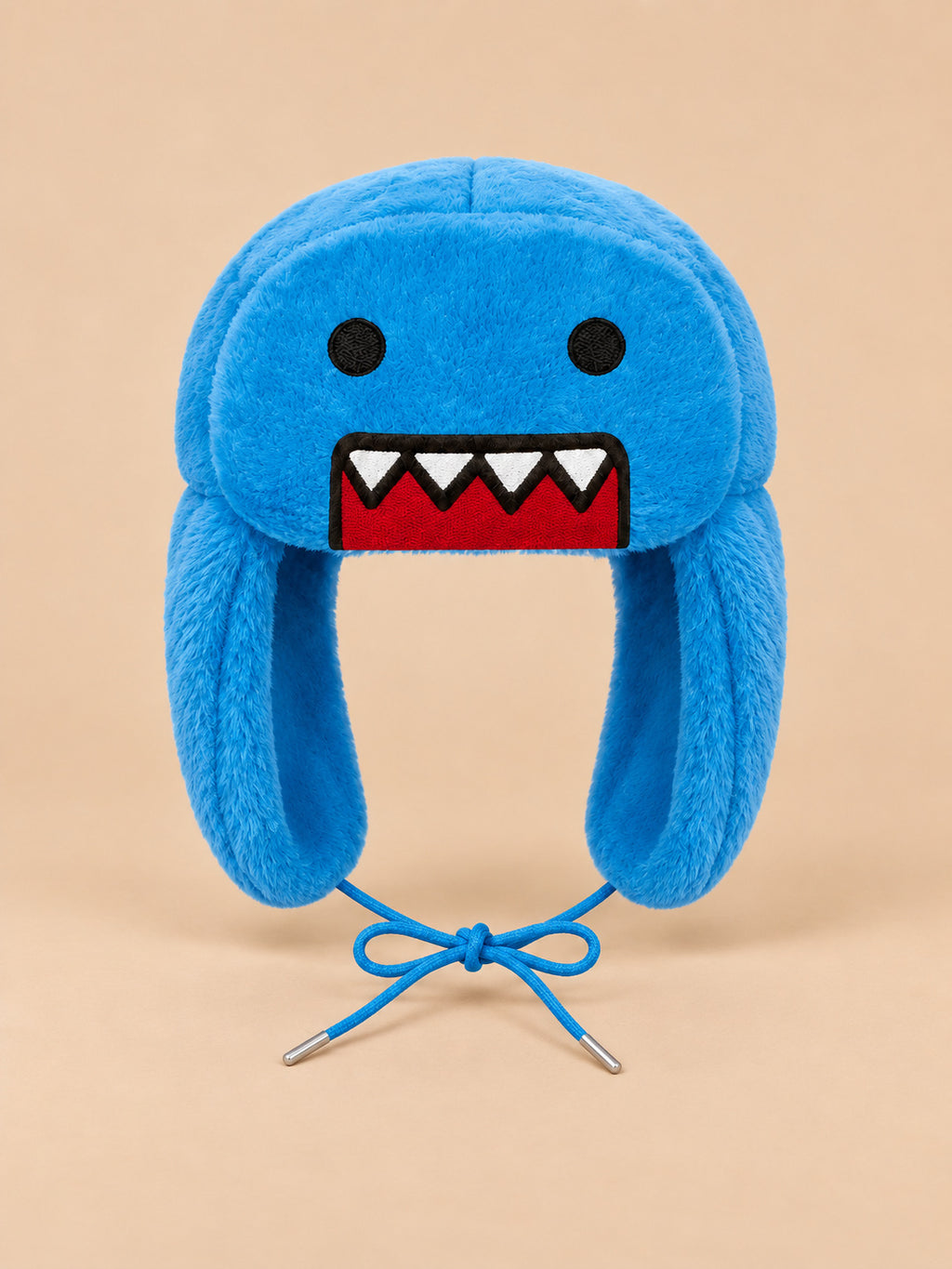 Gorro cálido con orejeras y dibujos animados, color azul, vista frontal en la fotografía del producto