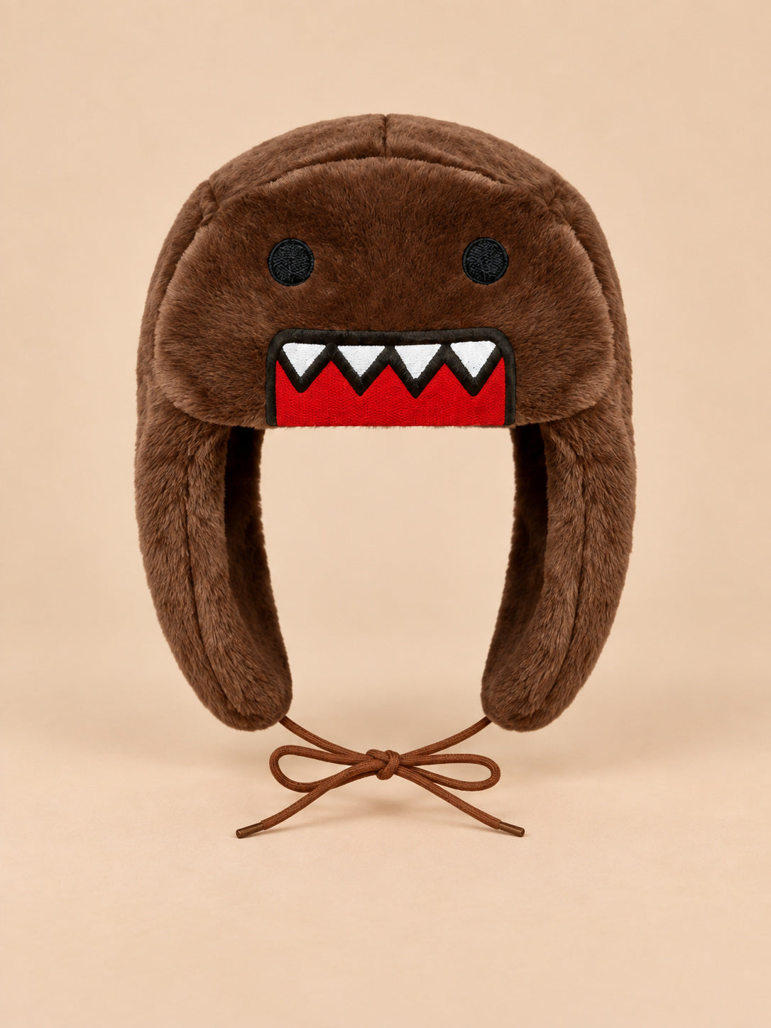 Bonnet enfant marron à oreillettes en peluche, motif dessin animé, vue de face