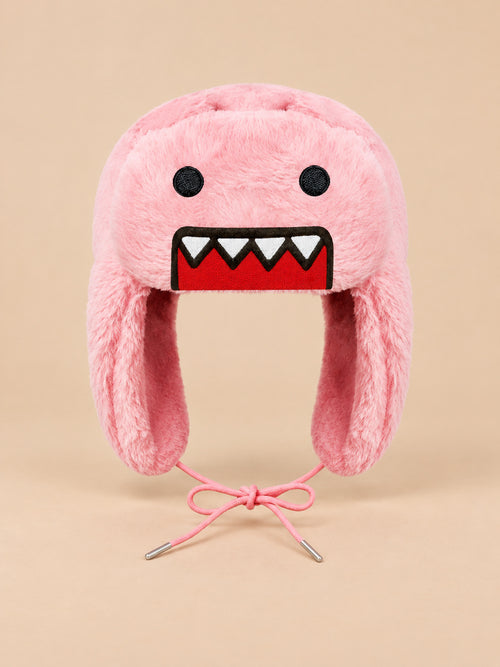 Gorro rosa con motivo de dibujos animados, orejeras laterales y superficie efecto peluche, vista frontal