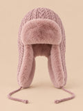 Gorro peruano de mujer con orejeras y cintas, color rosa empolvado, vista frontal