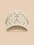 Turbante beige con motivo aireado de rejilla y canalé, de estilo japonés retro, fotografiado de frente