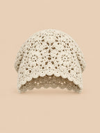 Turbante beige con motivo aireado de rejilla y canalé, de estilo japonés retro, fotografiado de frente