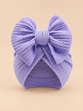 Gorro turbante anudado de bebé niña a juego con mamá, color violeta, vista frontal