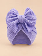 Gorro turbante anudado de bebé niña a juego con mamá, color violeta, vista frontal